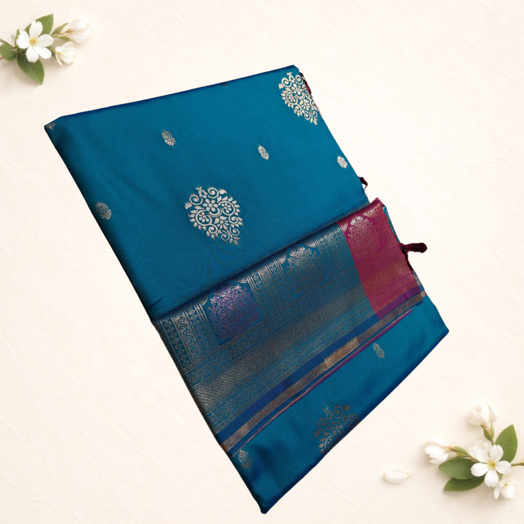 Synthetic sarees with big flower motives Contrast pallu and blouse  Softy material  Zari weaving with blouse and tessels